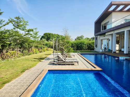 A large backyard swimming pool.